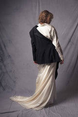 white silk dress that merges the style of an oversized shirt