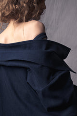 oversized denim shirt with straps to slide down exposing the shoulders