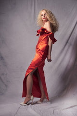 orange gown with high slit and ribbed corset