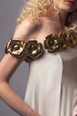 white gown with metal gold flowers