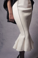 white pencil skirt with a wavy hem