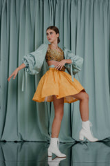 couture for teens Voluminous mini skirt in golden sunset orange. Silk taffeta with an irresistible sheen and the softest silk lining.