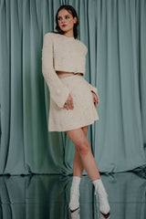 Luxury clothing for girls Wonderfully soft hand-knitted mini skirt with glass pearl detailing.