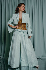 Gracious wide-leg silk lined trousers, complete with an amber-embroidered bodice and pleated details.