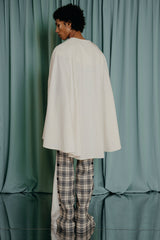 couture clothing for kids Luxurious off white cape detail with folds down the shoulder line