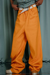couture clothing Oversized baggy fit skater type pants in bright orange. Extra long