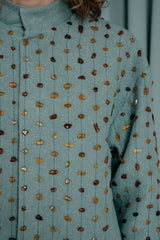couture clothing A luxurious bomber jacket in mesmerising Bermuda teel coloured linen