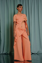 Flowy silk crêpe cropped top in a delicate shade. Fine gilded bead embroidery sparkling in the light.