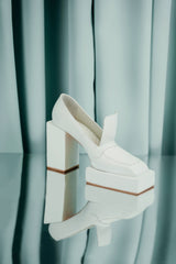 High heels crafted from genuine leather, featuring a unique and bold design