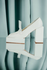 bold design where the shoe platform takes on the form of a geometric box