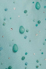 Embellished with semi precious stones, crystals and beads.