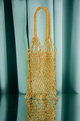 GLEAMING GOLD NET HANDBAG