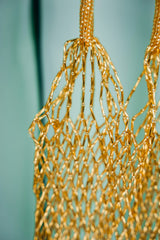 GLEAMING GOLD NET HANDBAG