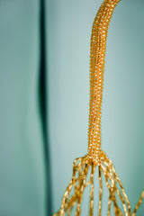 GLEAMING GOLD NET HANDBAG