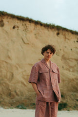Oversized linen safari shirt with four pockets.