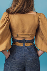 Elegant camel-coloured queen neckline crop-top.