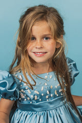 Ocean blue silk, full-skirt princess gown.