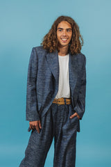 Elegantly tailored oversized suit jacket made of indigo blue silk linen.