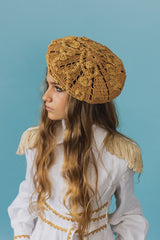 Elegant handcrafted crochet raffia beret adorned with beautiful Baroque floral details for your charmingly unmissable summer look.