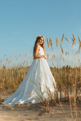 Magnificent soft white empire-style ball gown.