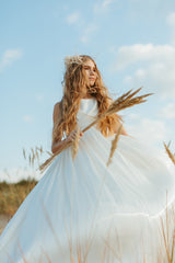 Magnificent soft white empire-style ball gown.