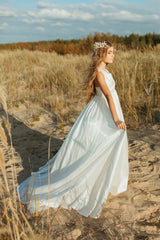 Magnificent soft white empire-style ball gown.
