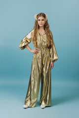 Charming golden silk jumpsuit with a deep V-neck and strings for closure at neckline.
