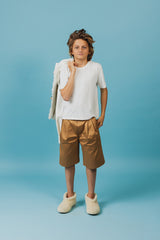 Relaxed-fit, wide-leg cotton shorts with front button closure.