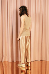 Bold and glamorous relaxed fit 7/8 length trousers in a soft golden shade.
