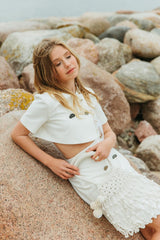 Gorgeous macrame handbag with a double handle and cotton lining expresses relaxed summer charm.