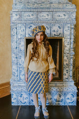 Royal velvet midi skirt with crossed golden ribbon stitching.