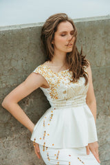 Royal silk duchess top with ruffle bottom that will accentuate the waistline.