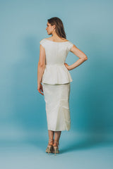 Royal silk duchess top with ruffle bottom that will accentuate the waistline.