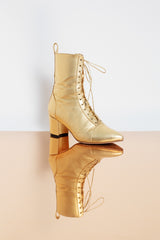 Expressive genuine leather golden block heel boots