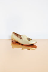 Elegant golden genuine leather moccasins with leather lining.