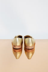 Elegant golden genuine leather moccasins with leather lining.