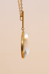 Dreamy gold-plated sterling silver pendant with a transparent natural crystal