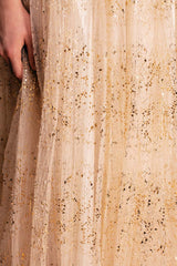 Magical golden champagne ball dress with a full tulle skirt and silk and cotton lining for volume and comfort.