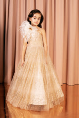 Off the shoulder sparkling princess golden ball gown with a full skirt and a layered upper part.