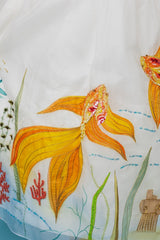 Exquisite silk taffeta and organza hand-painted and hand-embroidered full skirt midi dress with a magical deepsea motif.