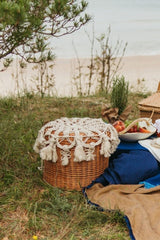 The Riviera Tabouret is entirely hand-made and adorned in macramé.