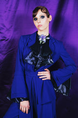 Deep indigo blouse with flounce sleeves and cascade collar