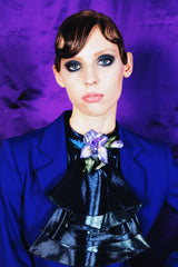 Deep indigo blouse with flounce sleeves and cascade collar