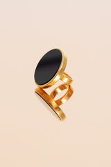 Elegant gold-plated sterling silver ring with round onyx.