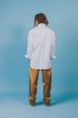 White twill cotton shirt with baseball hem that's longer on the back and rounds up on the sides.