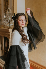 Elegant black swan feather accessory with crystals.