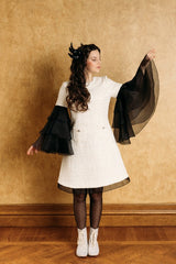 Elegant black swan feather accessory with crystals.