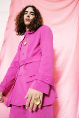 Hot pink statement safari-style jacket with a two-button belt.Hot pink statement safari-style jacket with a two-button belt.