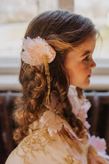 Delicate hand-crafted silk flower hair clip with golden crystal strips.