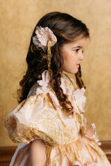 Delicate hand-crafted silk flower hair clip with golden crystal strips.